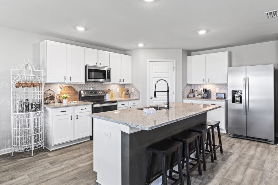 Prepare your favorite meals in the spacious, fully equipped kitchen.