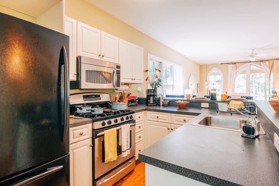 Our bright and compact kitchen makes cooking a breeze.