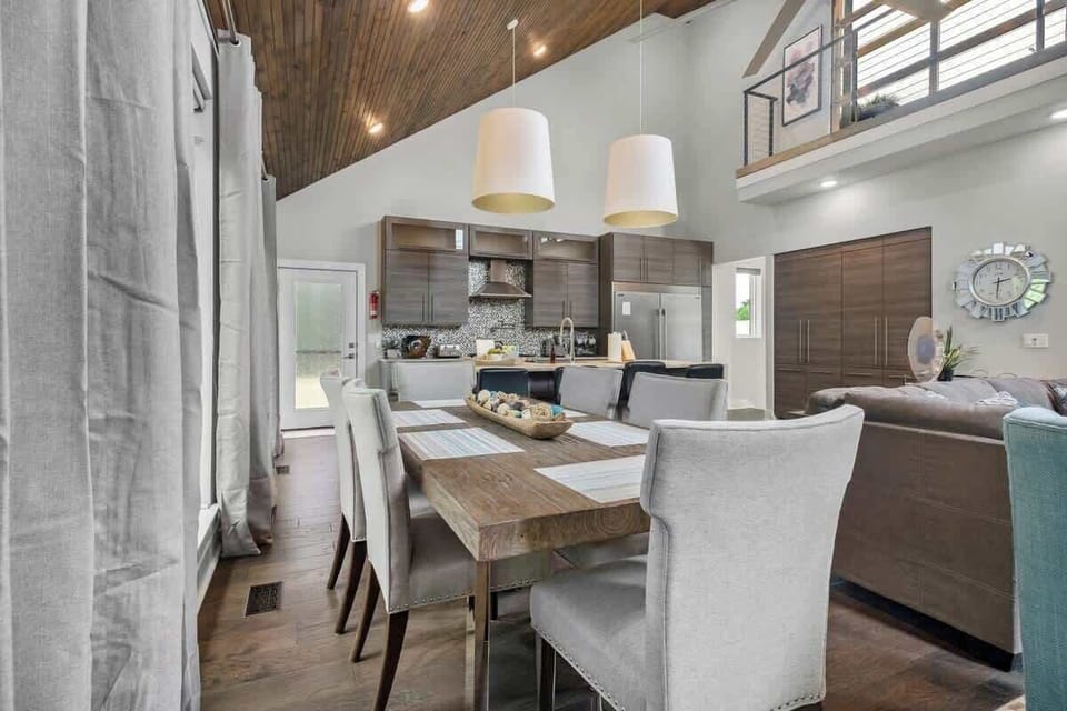 Directly behind the living area, you'll see our 6-top dining table.