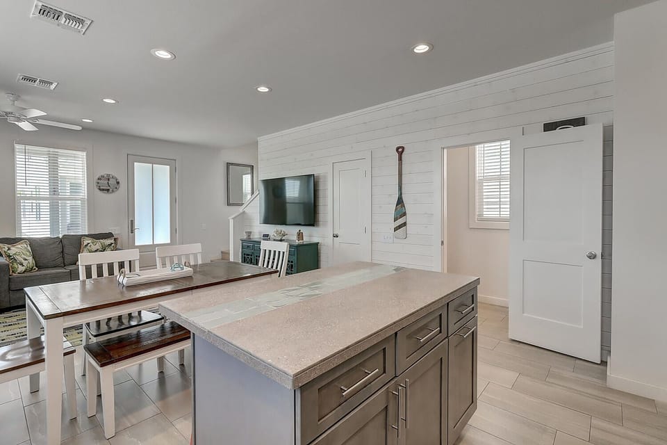 Kitchen - Easy, breezy entertaining with a bright open layout from kitchen to dining