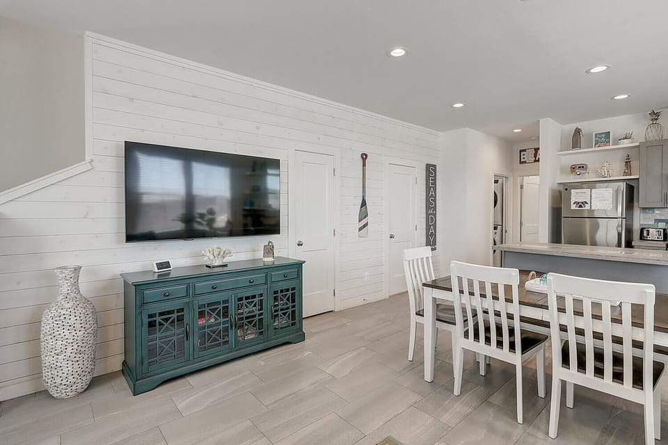 Family Room - Large flat screen TV centrally located in this Great Room