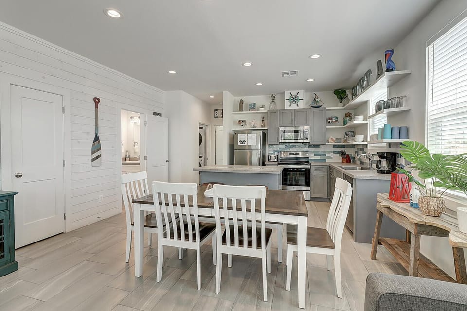 Dining table seating 6 - Share meals and laughter in the stylish dining area, enhanced by the coastal ambiance.