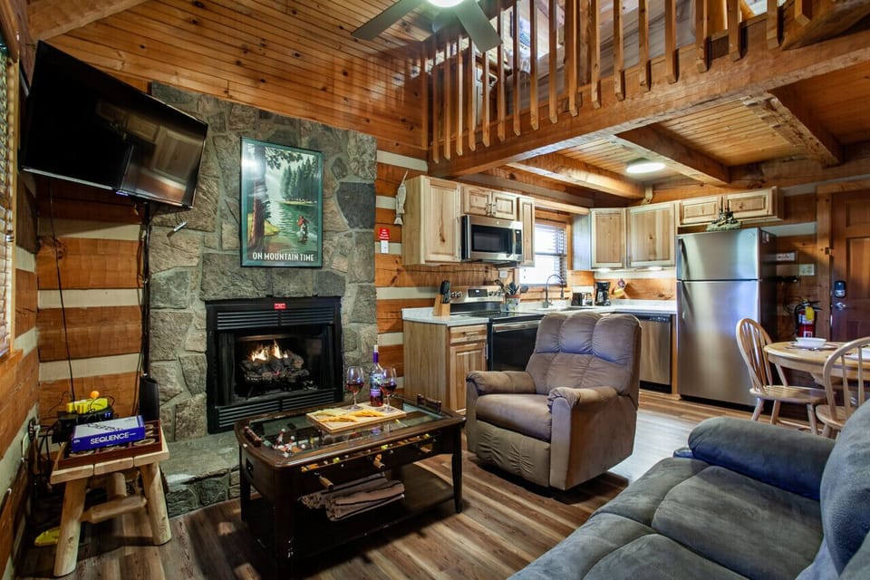 Rustic beams, plush seating, and a cozy fire – your home away from home.