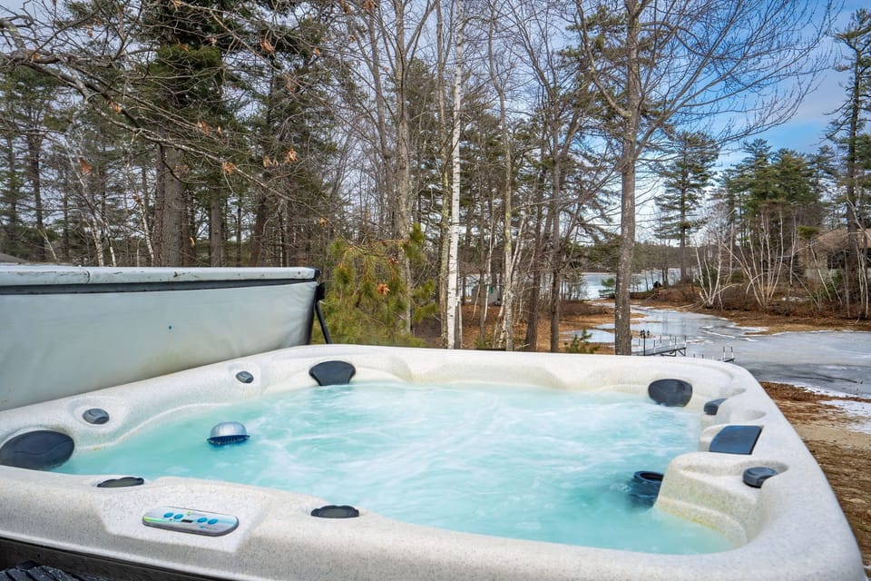 Relax in the hot tub while snowflakes fall—a winter experience like no other.
