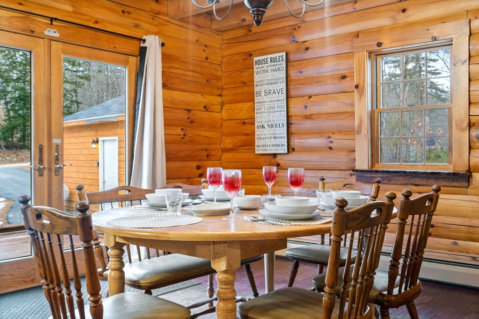 Gather around the table—enjoy a meal together while taking in beautiful lake views through the large windows.