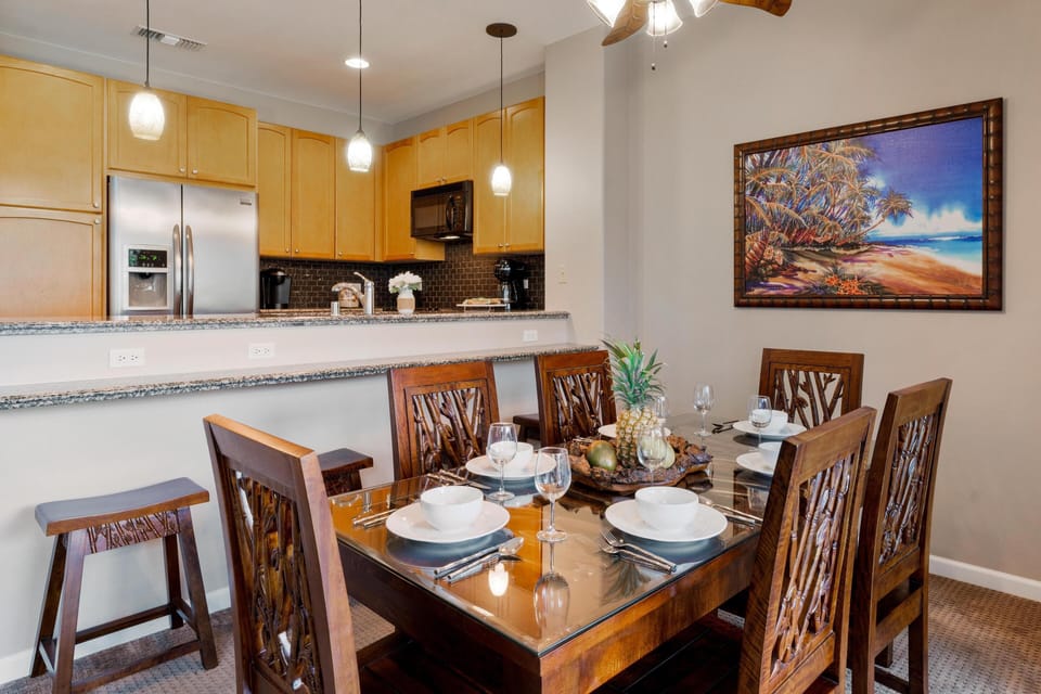 Open layout between kitchen and dining.