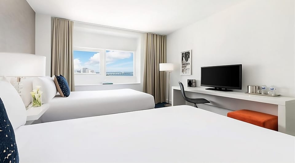Wake up to sunshine, plush beds, and a calm workspace.