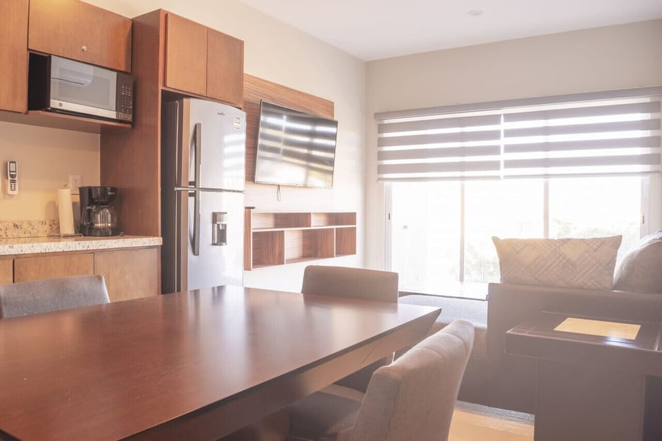 Comedor, cocina y sala de estar