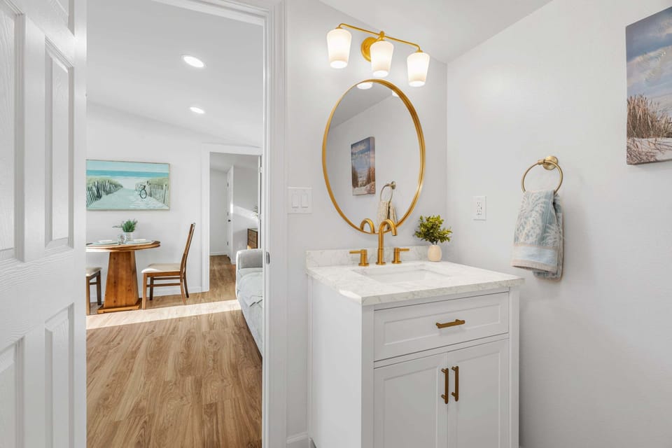 Full Bath located with a standing shower. 

Our home is stocked with clean products and toiletries so that you and your loved ones can enjoy a toxin-free stay!