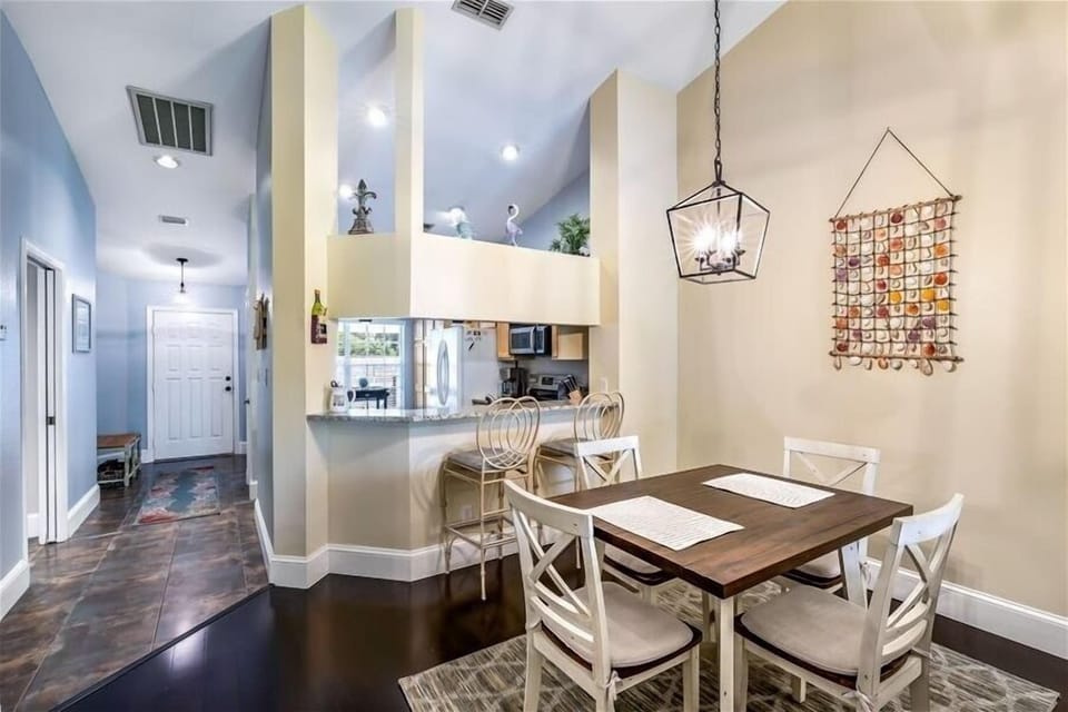 Front entry, kitchen & dining area