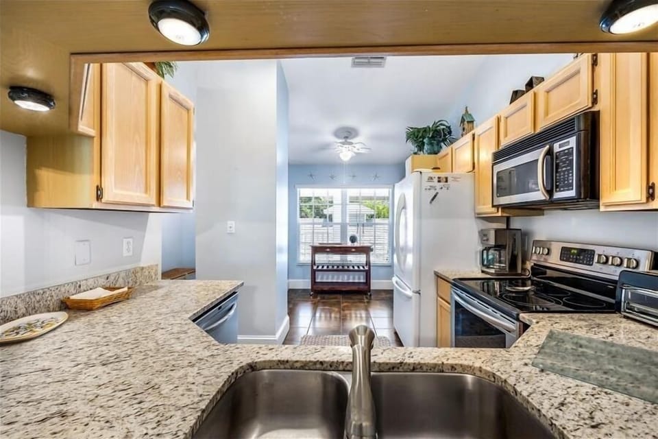 Pass through kitchen into dining room