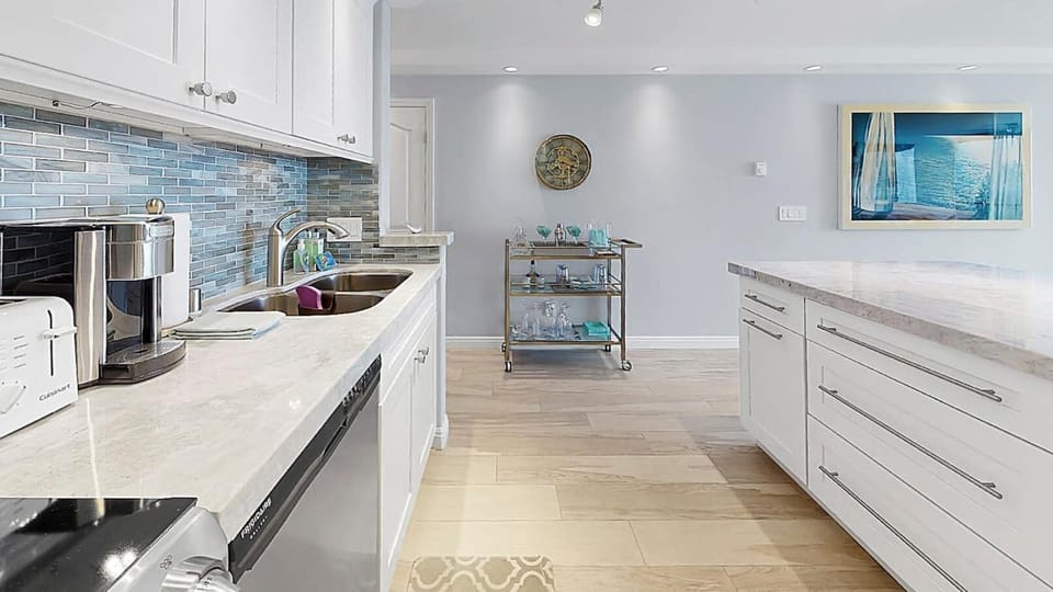 Modern, light and bright all-new kitchen with stainless steel appliances.