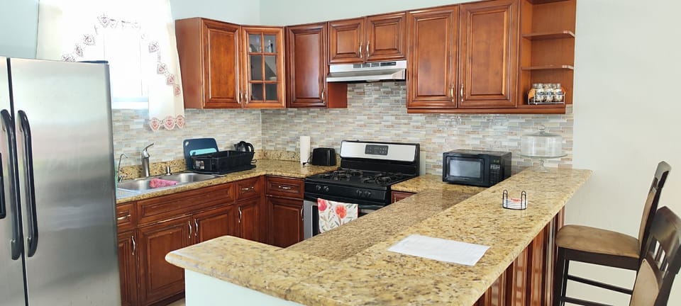 KITCHEN WITH STAINLESS STEEL APPLIANCES