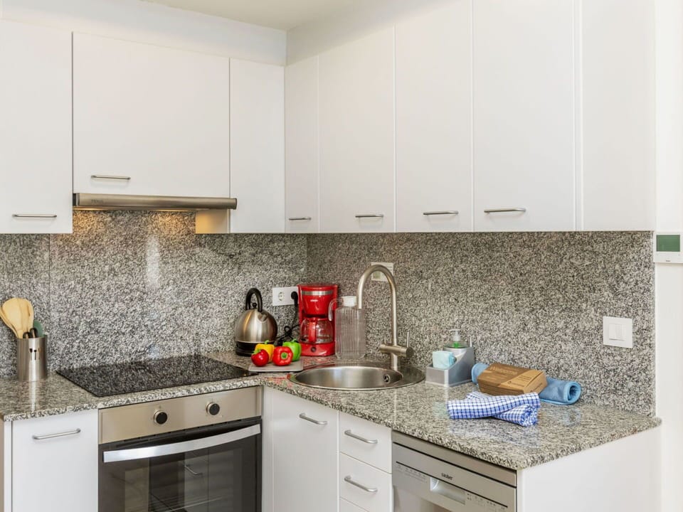 Kitchen, Countertop, Kitchen Appliance, Major Appliance, Interior Design, Cabinetry, Flooring, Kitchen Stove, Home Appliance, Floor