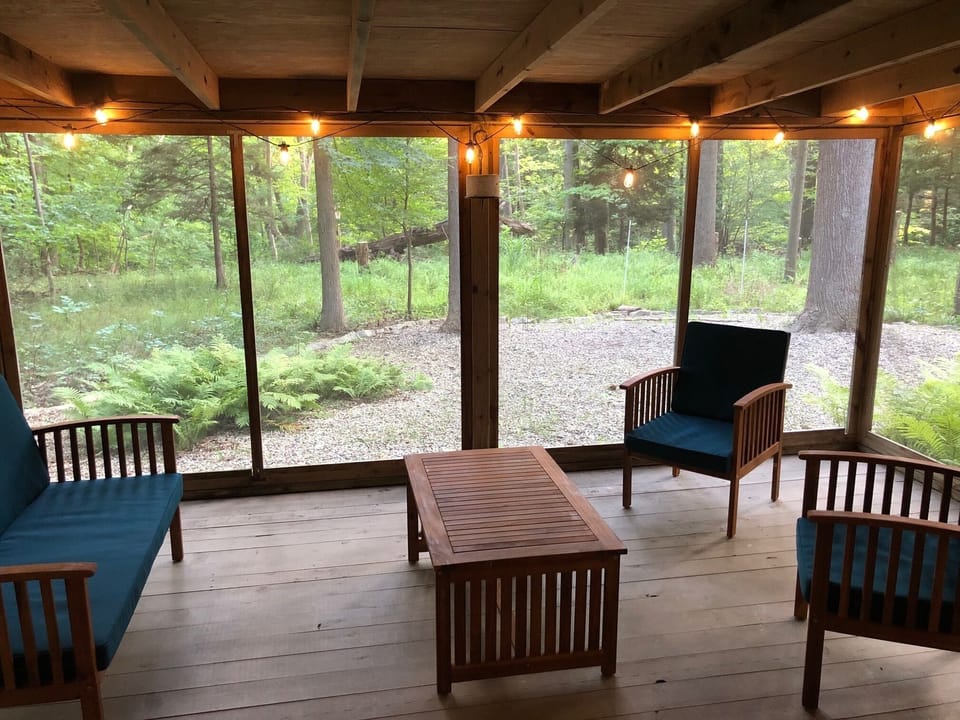 Screened in porch downstairs