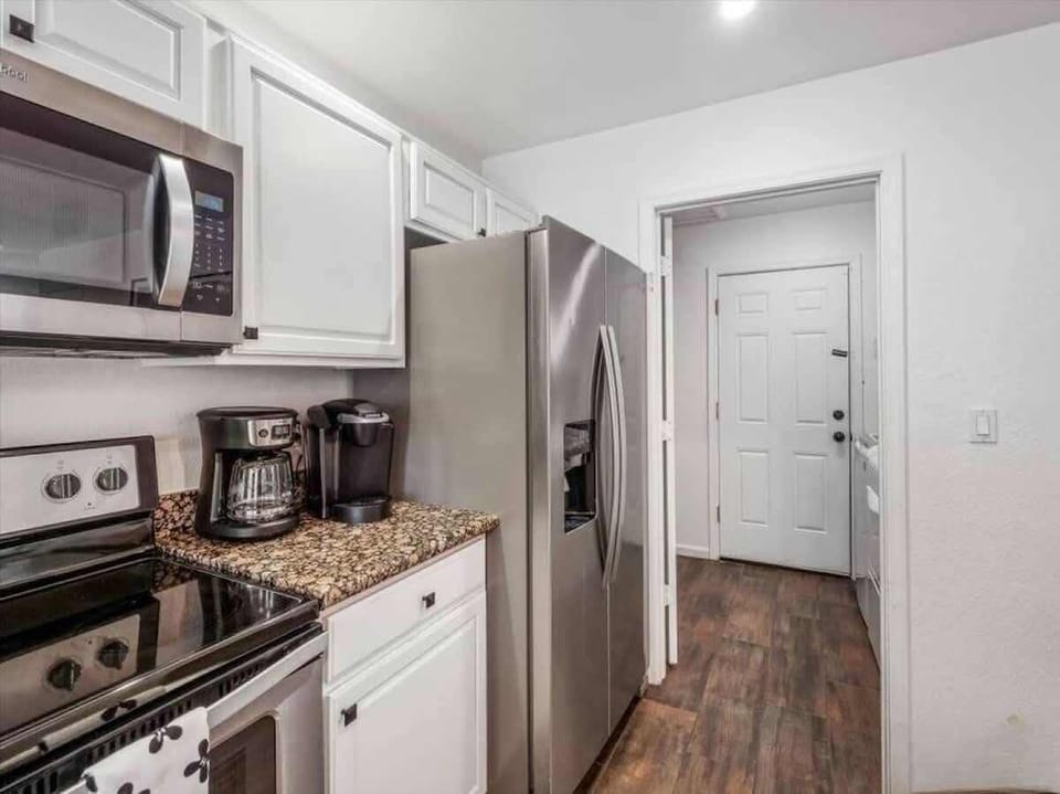 Your fully equipped kitchen awaits with stainless steel appliances, granite countertops, and everything you need to prepare your favorite meals during your stay.