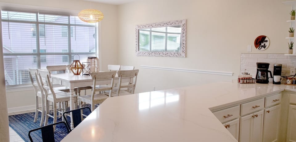 Beautiful and comfy seating for 8, with seating for 7 more at the kitchen bar!