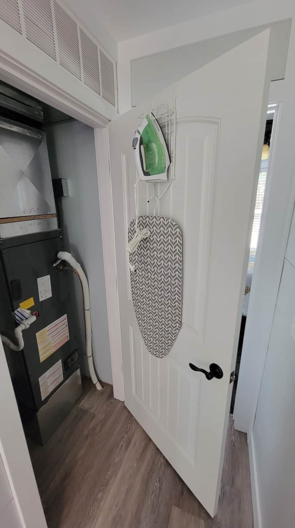 Ironing Board and Iron in Closest 