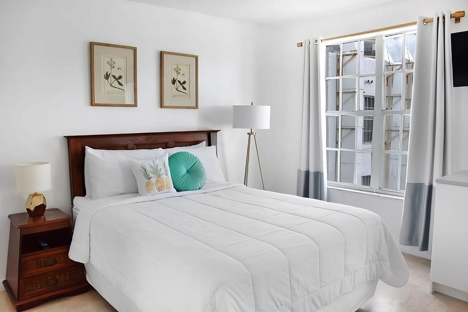 Settle into a serene queen bed with cozy, hotel-style comfort.