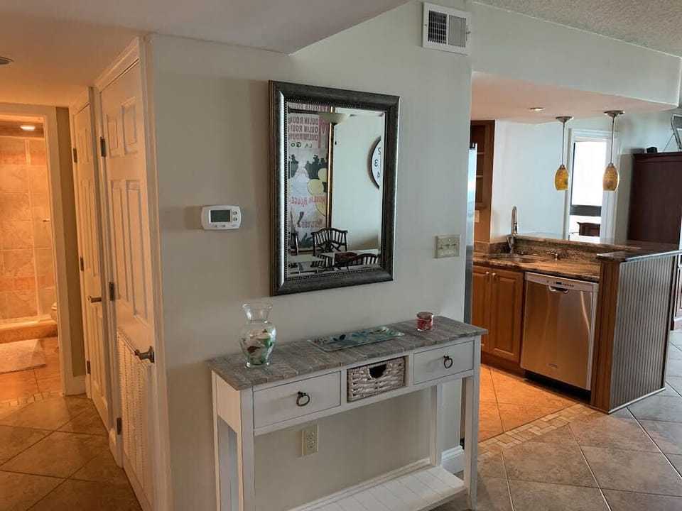 Welcome! 2 BR and bath with walk-in shower to the left. MBR overlooks the beach.