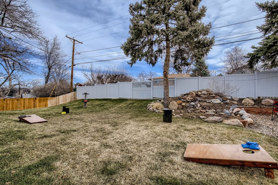Back yard games included a disc golf hole, bags, and can-jam. 