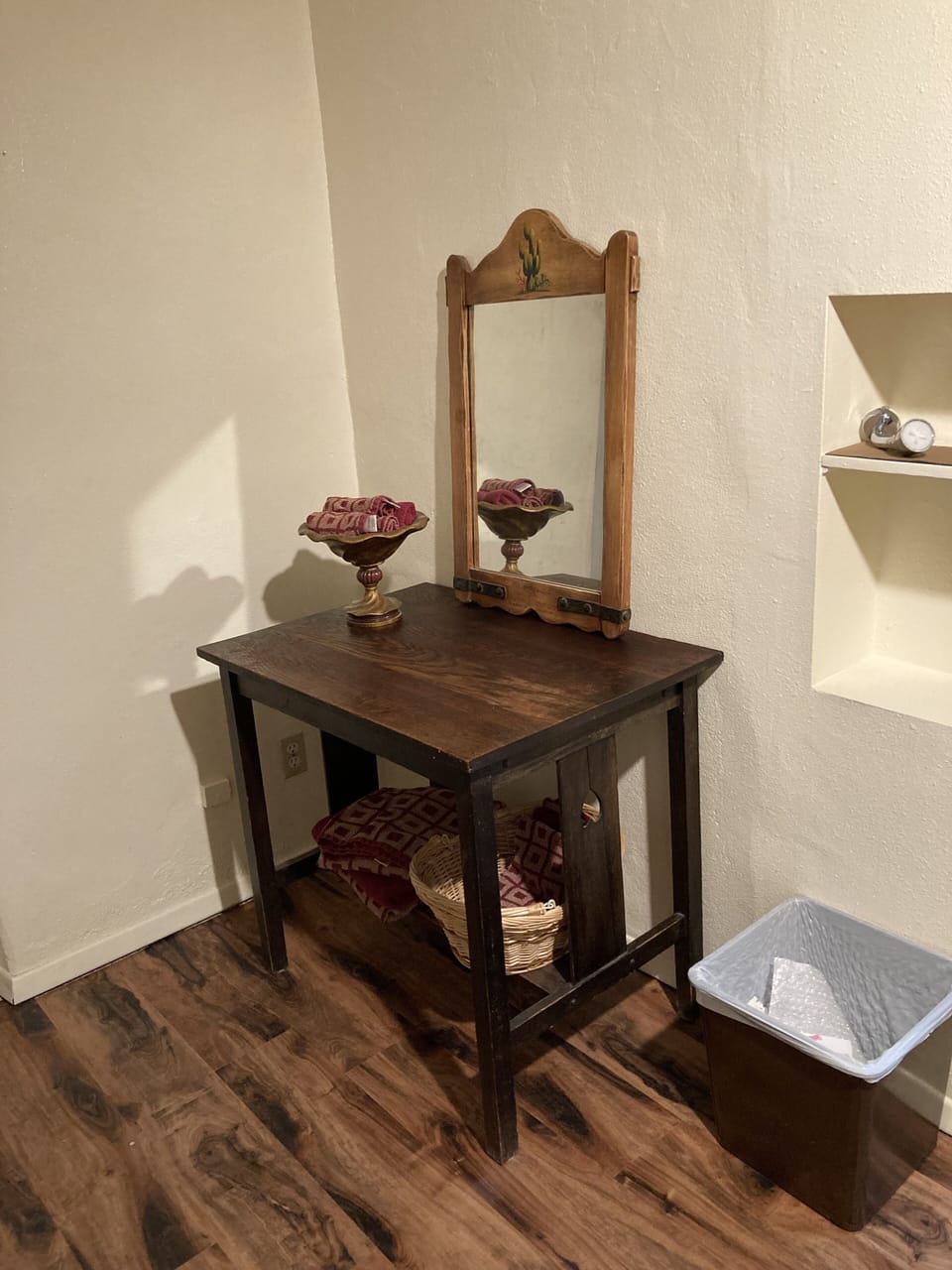 Table on landing outside bathroom.