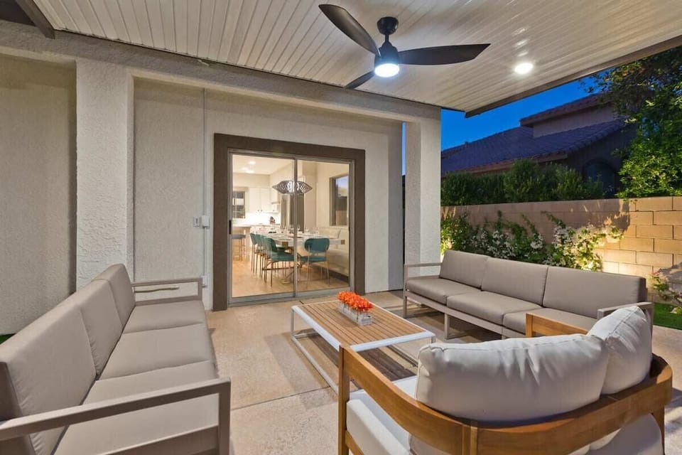 Outdoor covered patio with fan and lighting