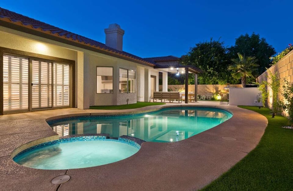 Backyard Pool and Jacuzzi at Night