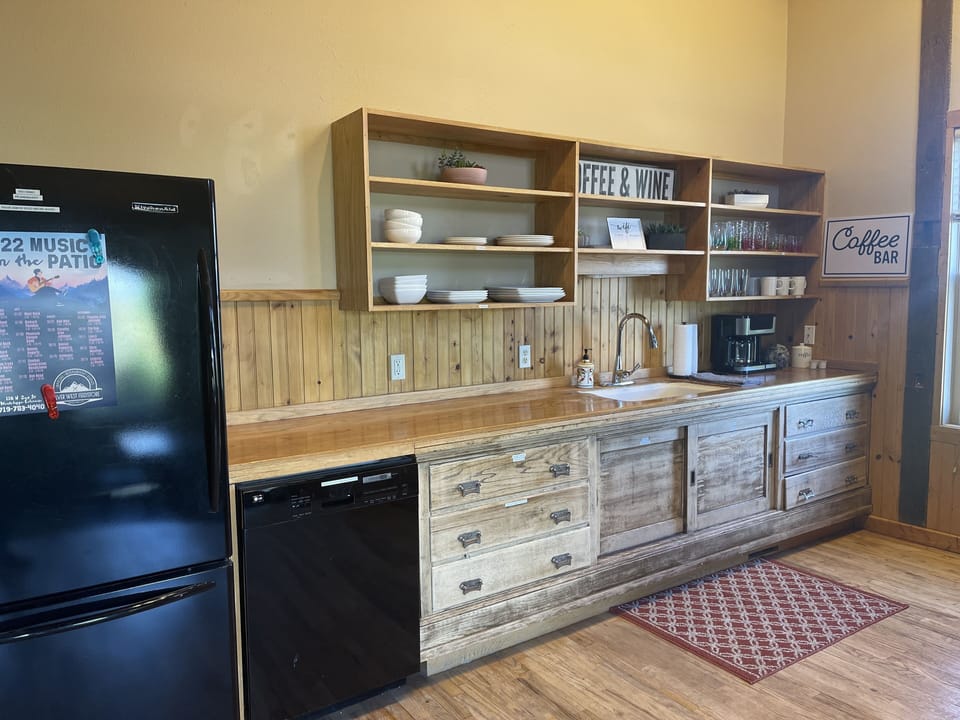 Kitchen with Fridge, dishwasher, oven/stove, Keurig/coffee pot. 
