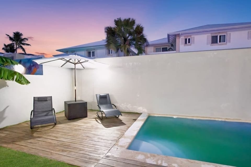 Backyard at night with private pool access