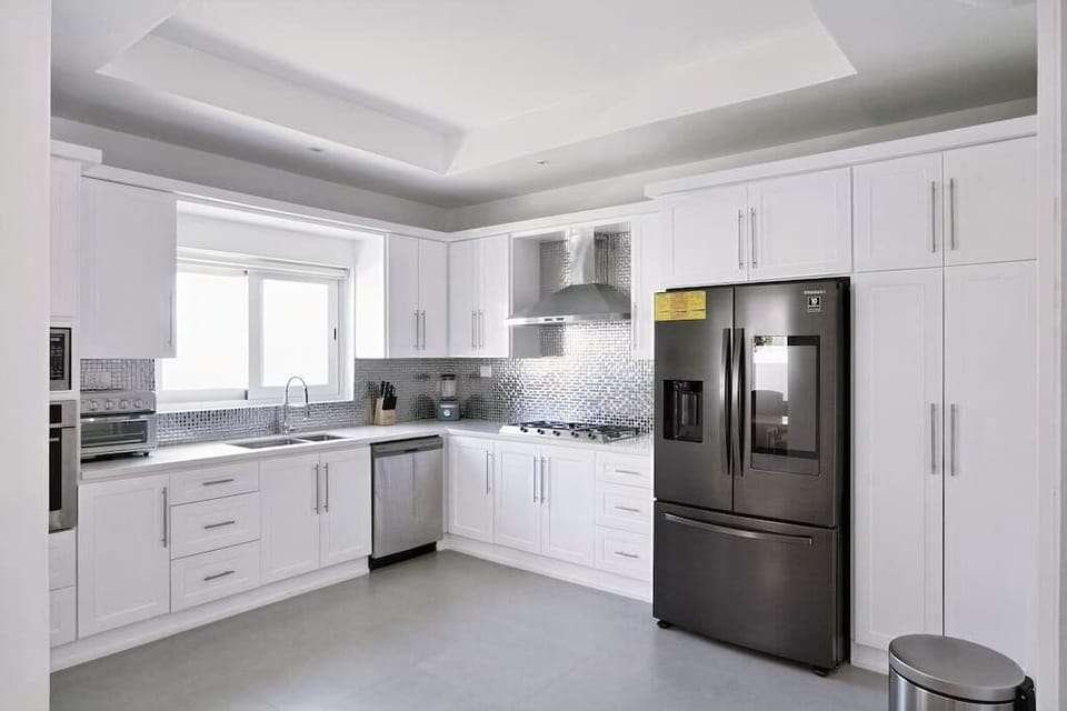 Full Kitchen featuring Samsung Smart fridge with touch screen