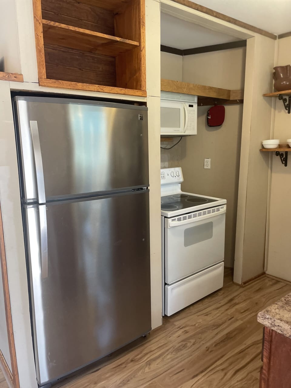 The refrigerator has an ice maker, so fill the cooler for the big game!