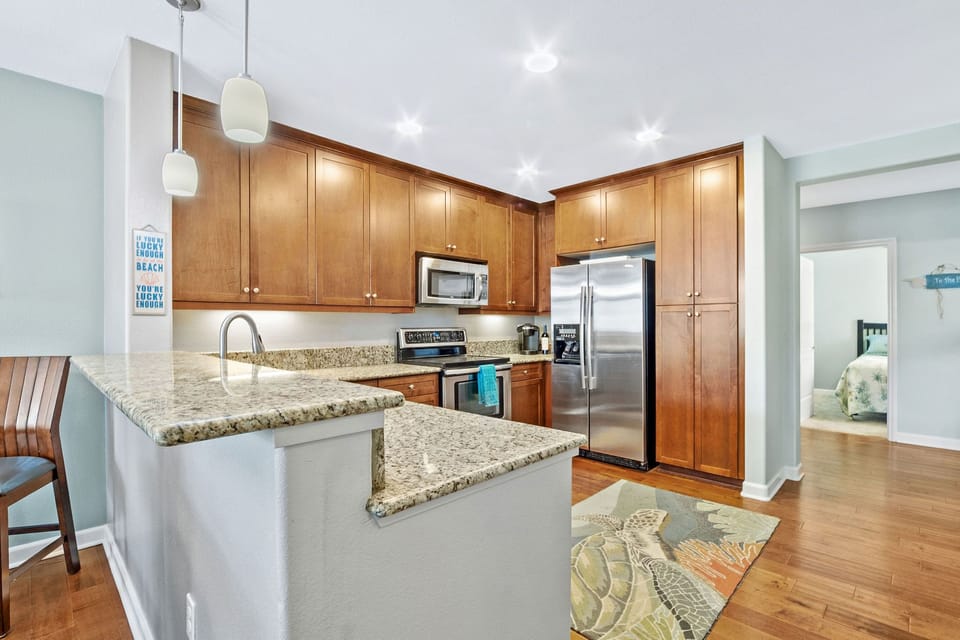 Kitchen with stainless steel appliances and granite countertops