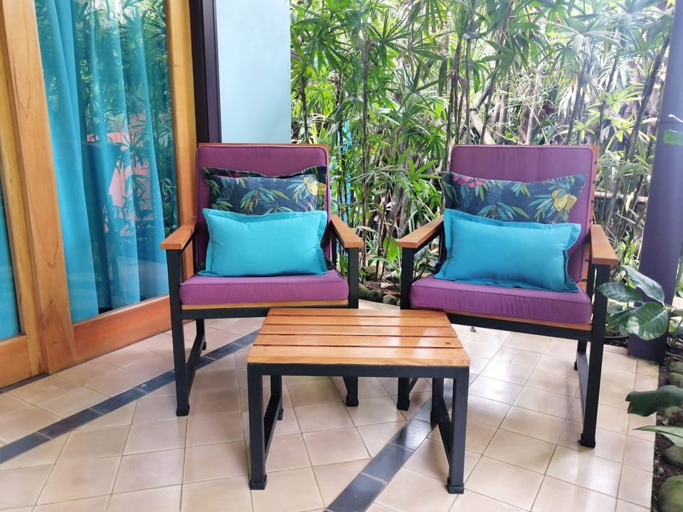 Private patio surrounded by gardens