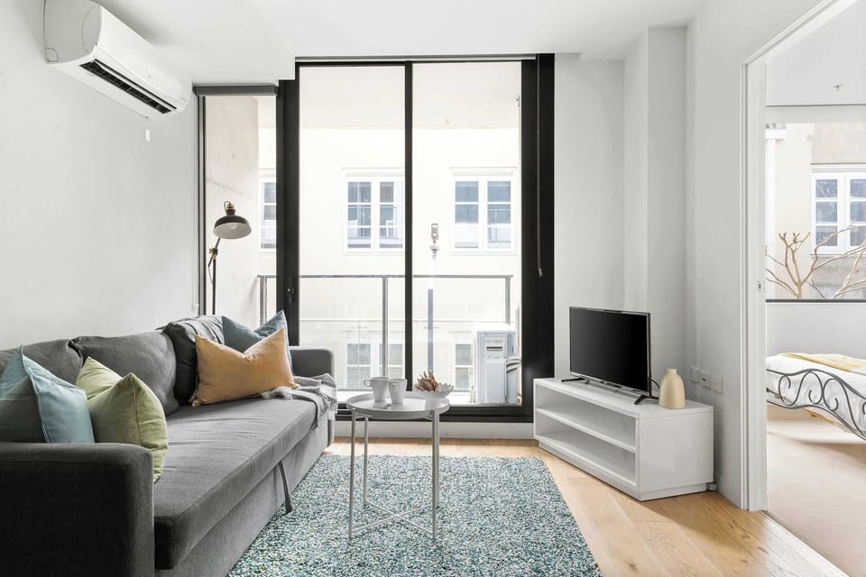 The living area with a 3-seater sofa bed that folds out to a queen.
