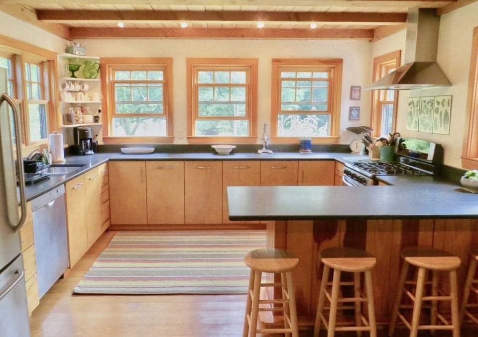 Kitchen with stainless appliances, very well-stocked for all your needs