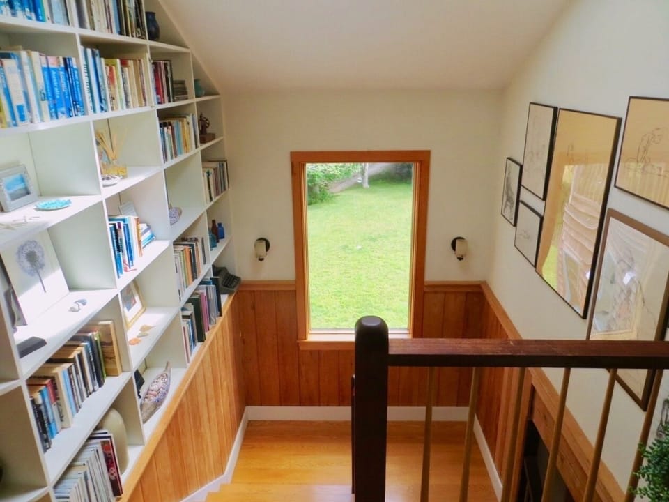 Stairwell with bookshelves