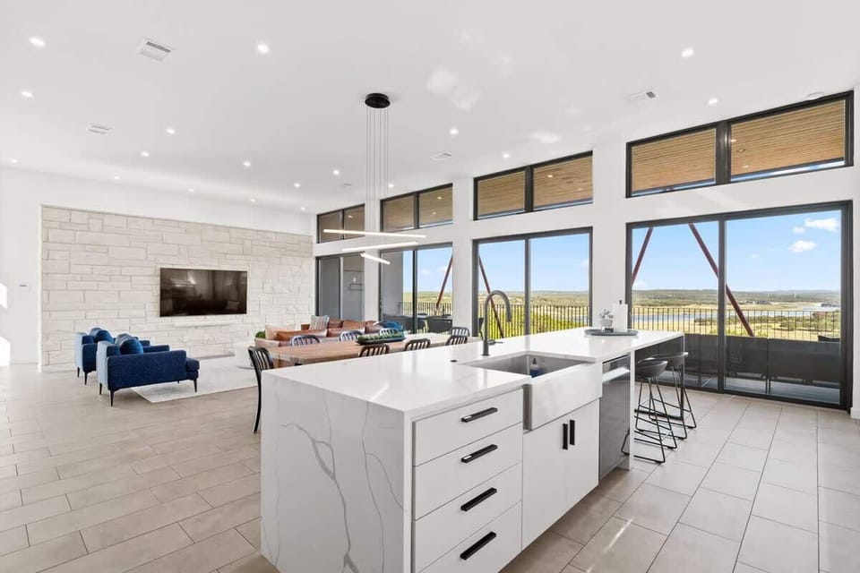 Kitchen island with lake views and open-concept entertaining space