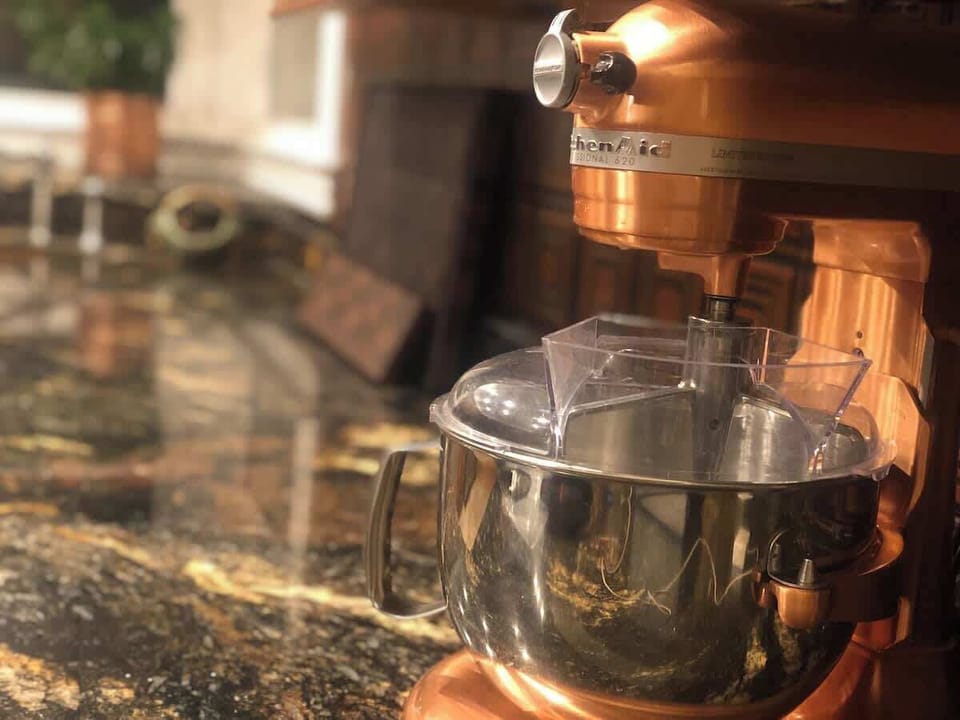 Kitchen with Granite Counters and Professional Appliances