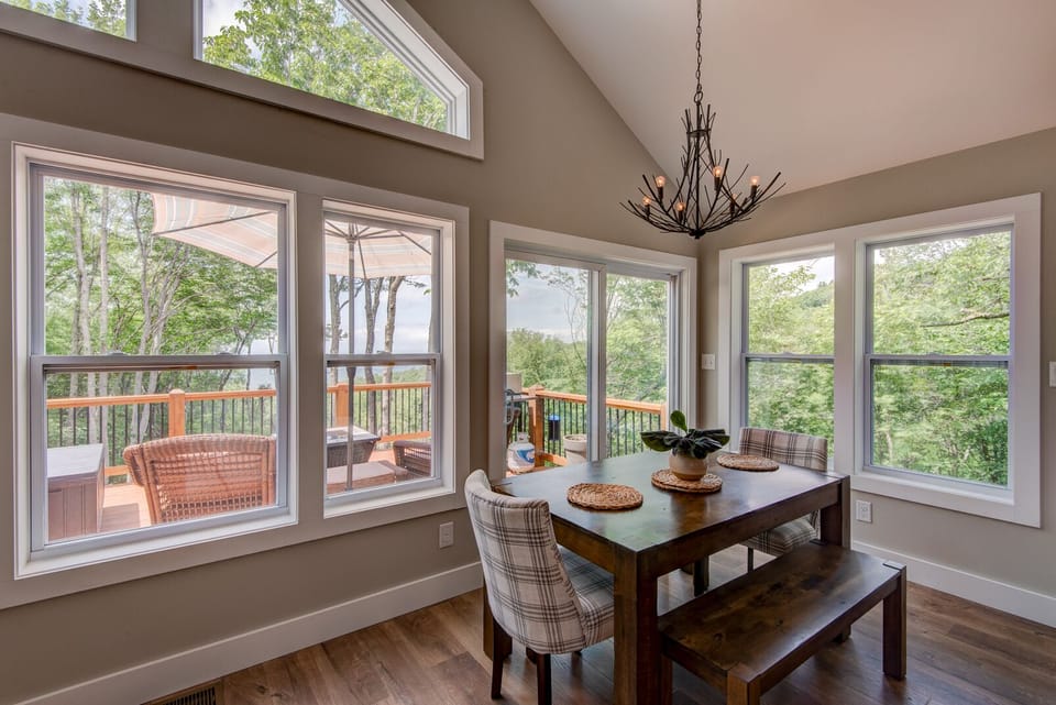 Soak in the treetops while you dine. Vaulted ceilings and walls of windows make every meal feel like a retreat at Lessons From Mars.