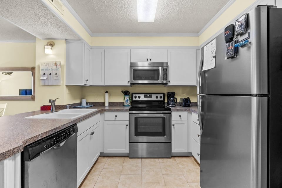 Kitchen Area Well Stocked  For Cooking
