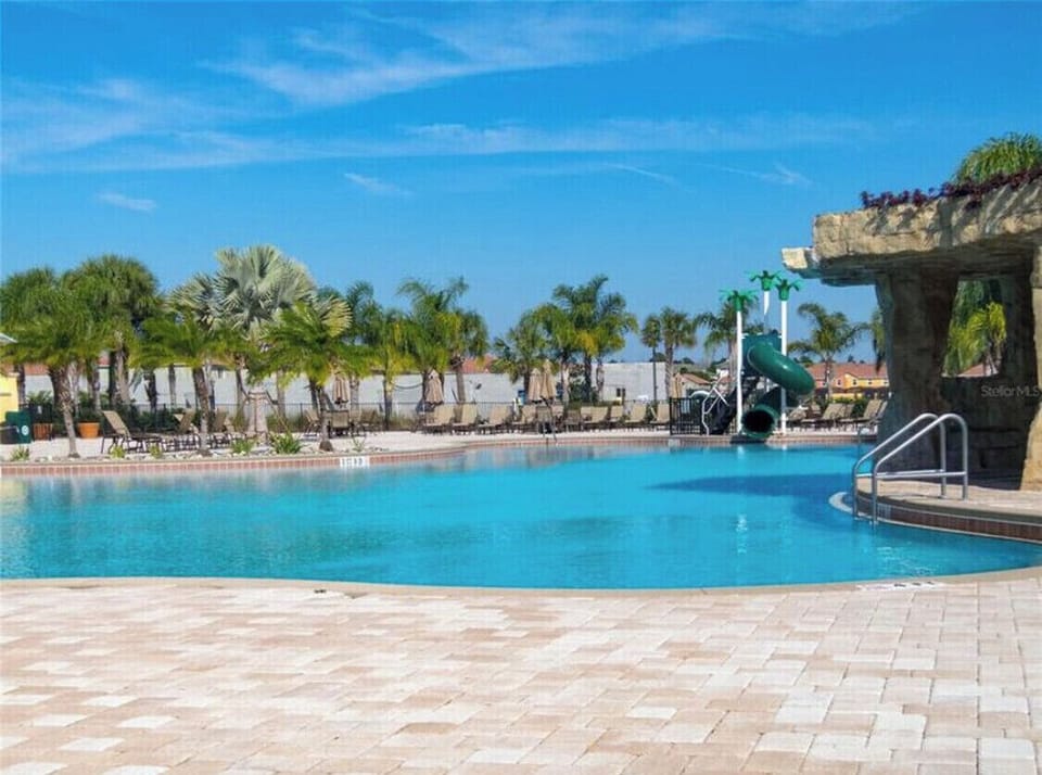 Large heated community pool - slide and hot tubs