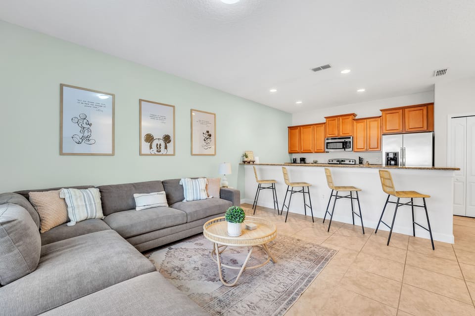 Large living room, kitchen, and dining area to gather