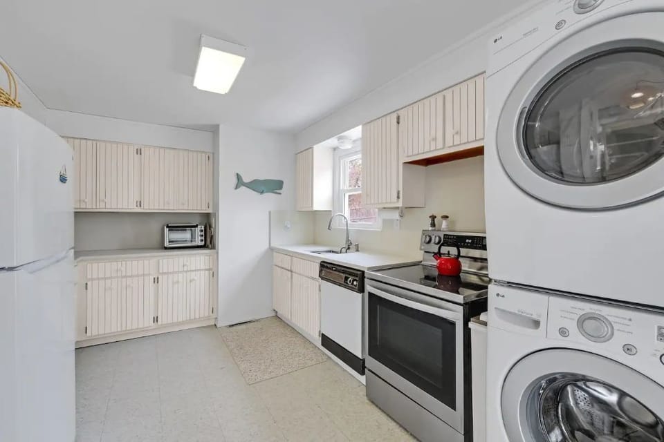 Large stocked Kitchen with sliders to deck