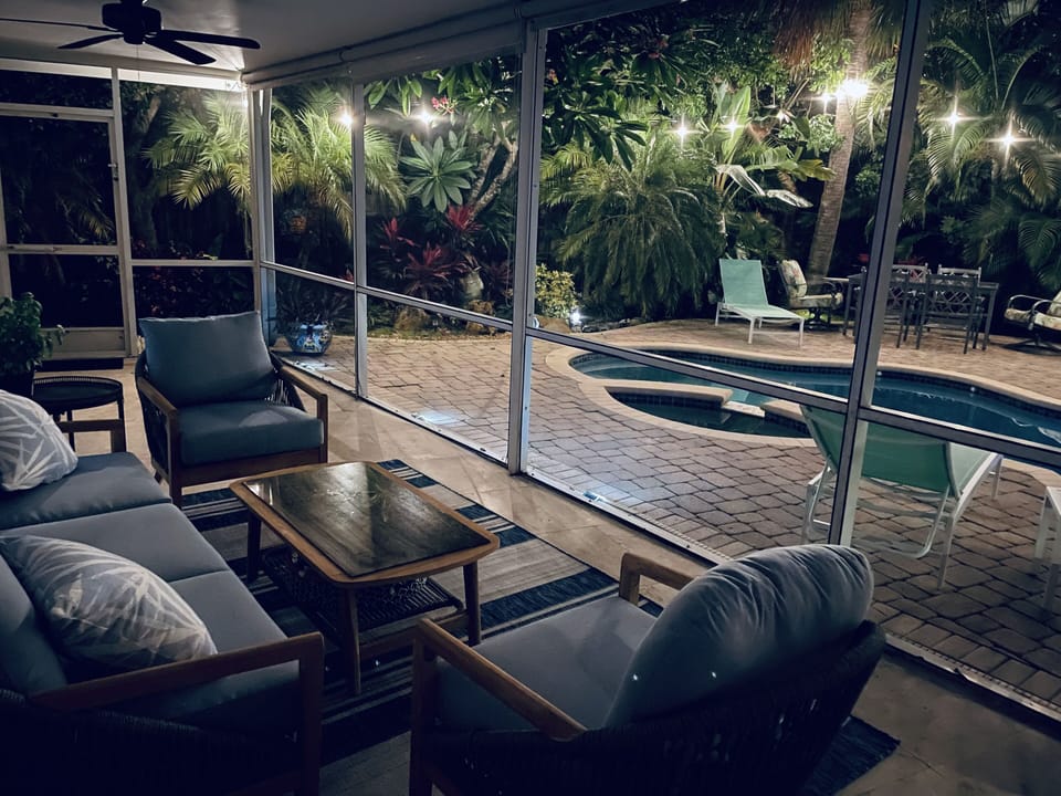 Evening ambiance, outdoor/patio sitting area and outdoor/patio dining area.