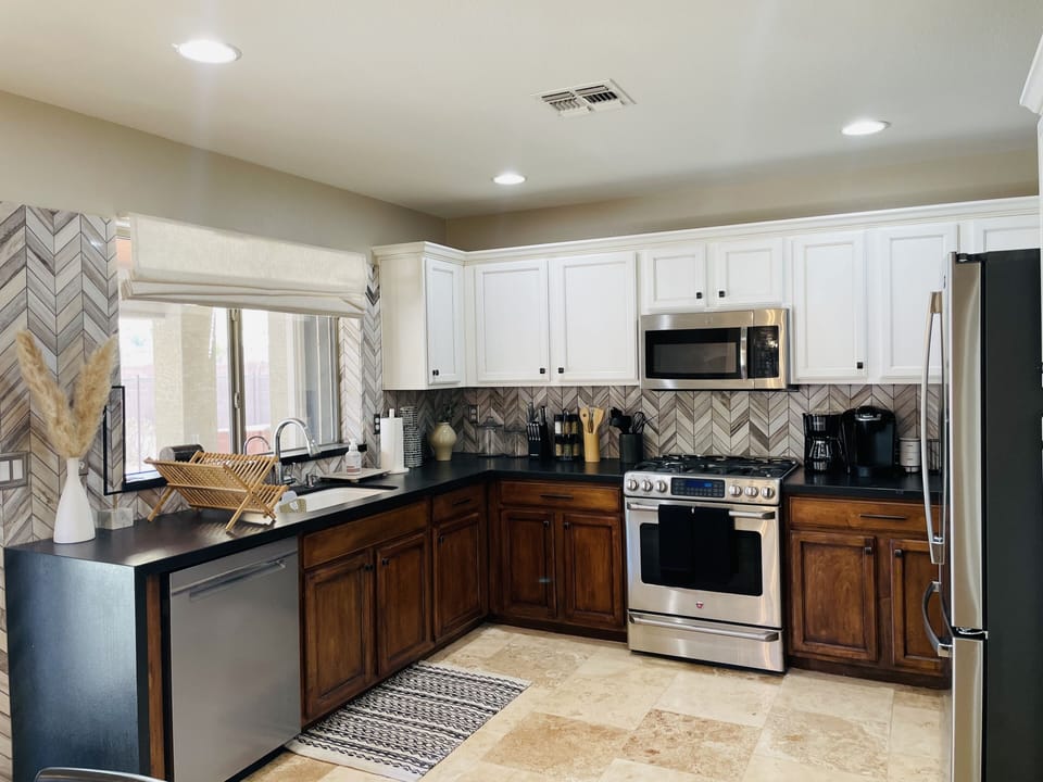 Fully equipped kitchen for family meals and morning coffee.