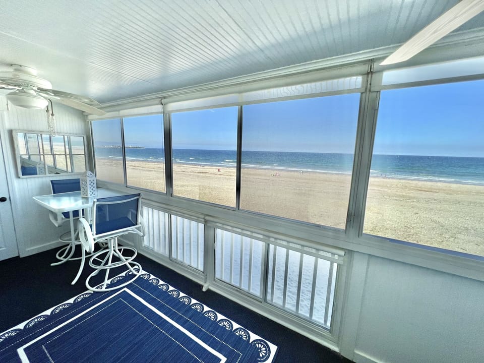 Enjoy your coffee/breakfast on your 3 season porch watch the waves roll in