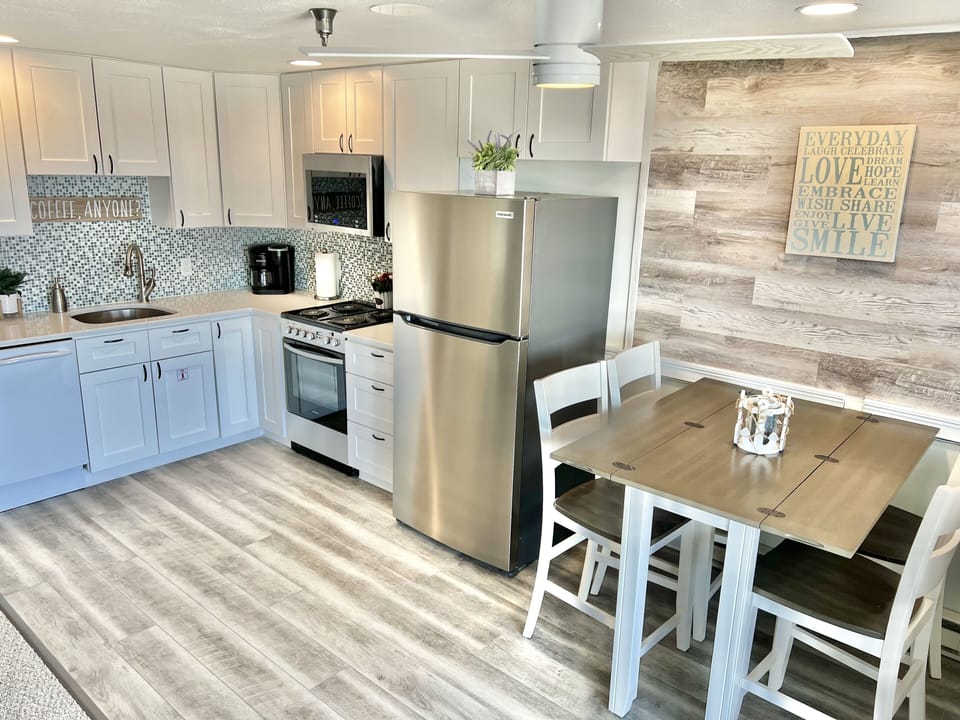 Cook up your seafood dinner in open concept kitchen with new appliances.