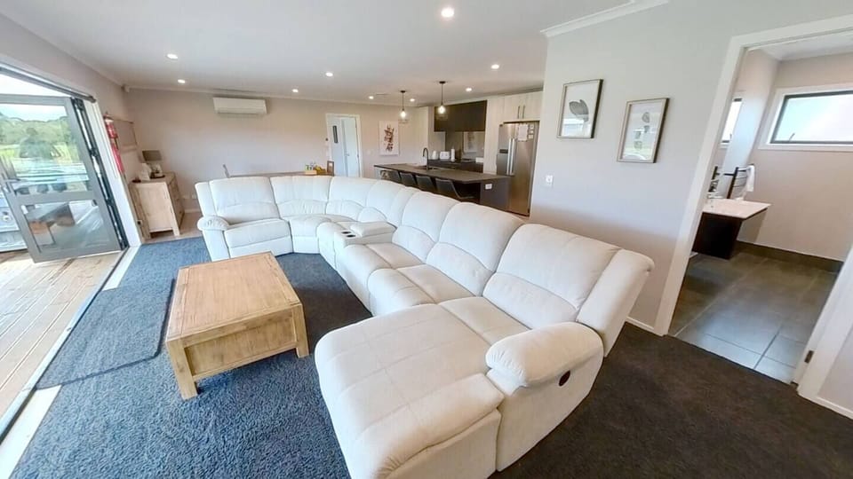 Living room to kitchen and dining in house 1