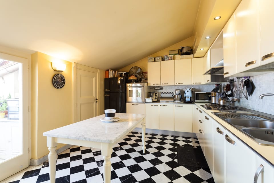 Kitchen room, fully equipped, oven, utensils, coffee maker, dishwasher, balcony